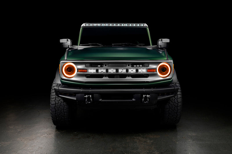 Load image into Gallery viewer, Front view of bronco with oculus turned on - amber DRL