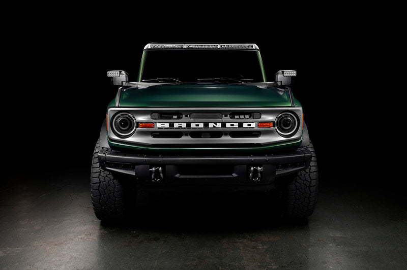 Load image into Gallery viewer, Front view of green ford bronco
