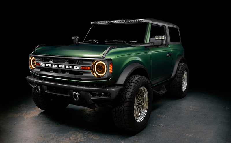 Load image into Gallery viewer, Three quarters view of bronco with oculus turned on - amber DRL
