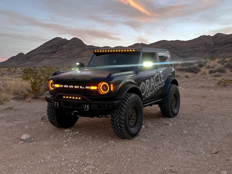 Load image into Gallery viewer, ORACLE bronco in the desert with bright amber LED lighting
